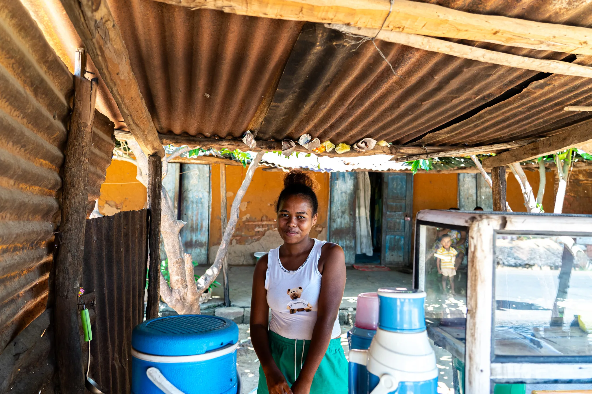 Portrait of a young woman coffee seller in Mahajuna, Madagascar