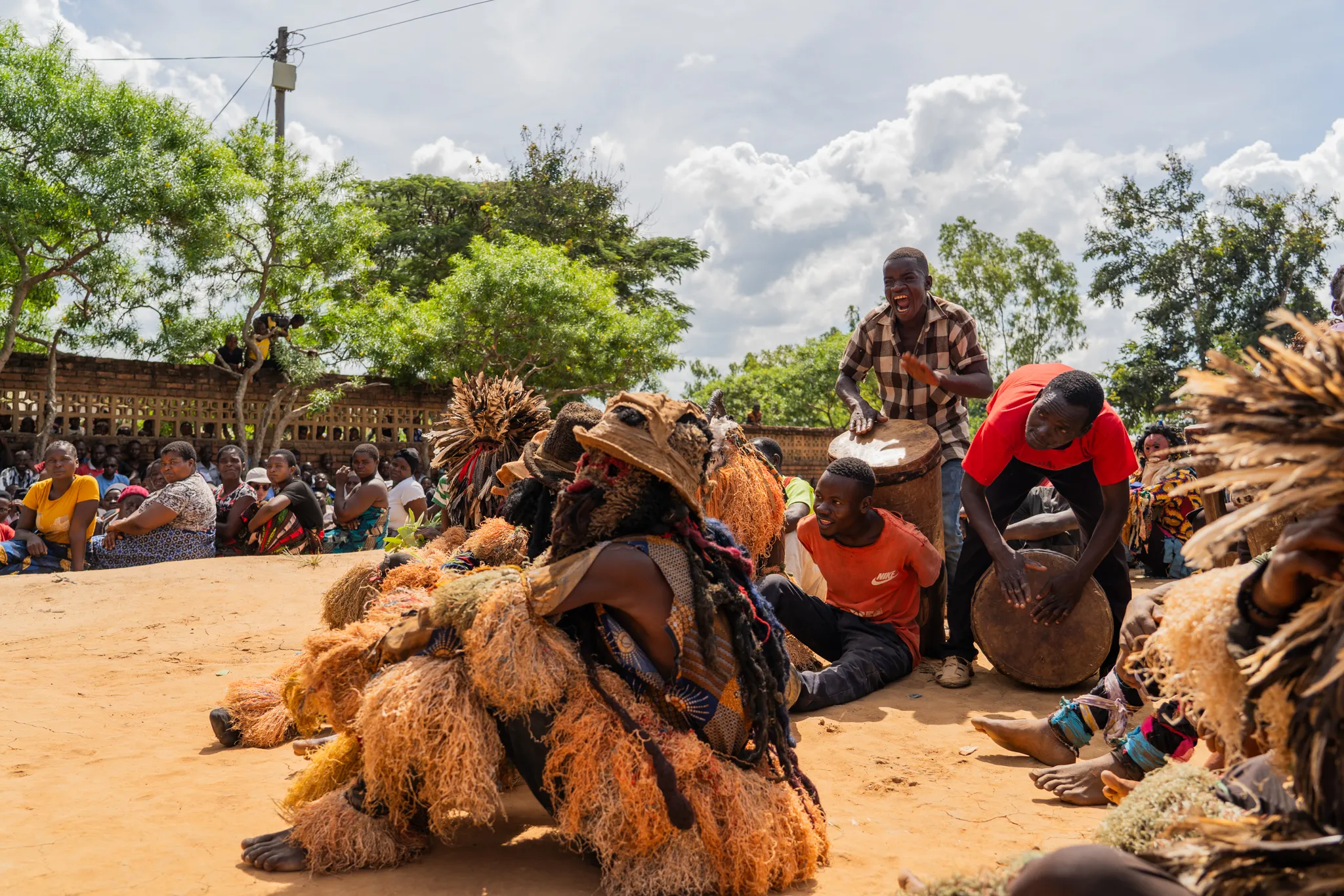 Gulewamkulu performing at a funeral, Malawi