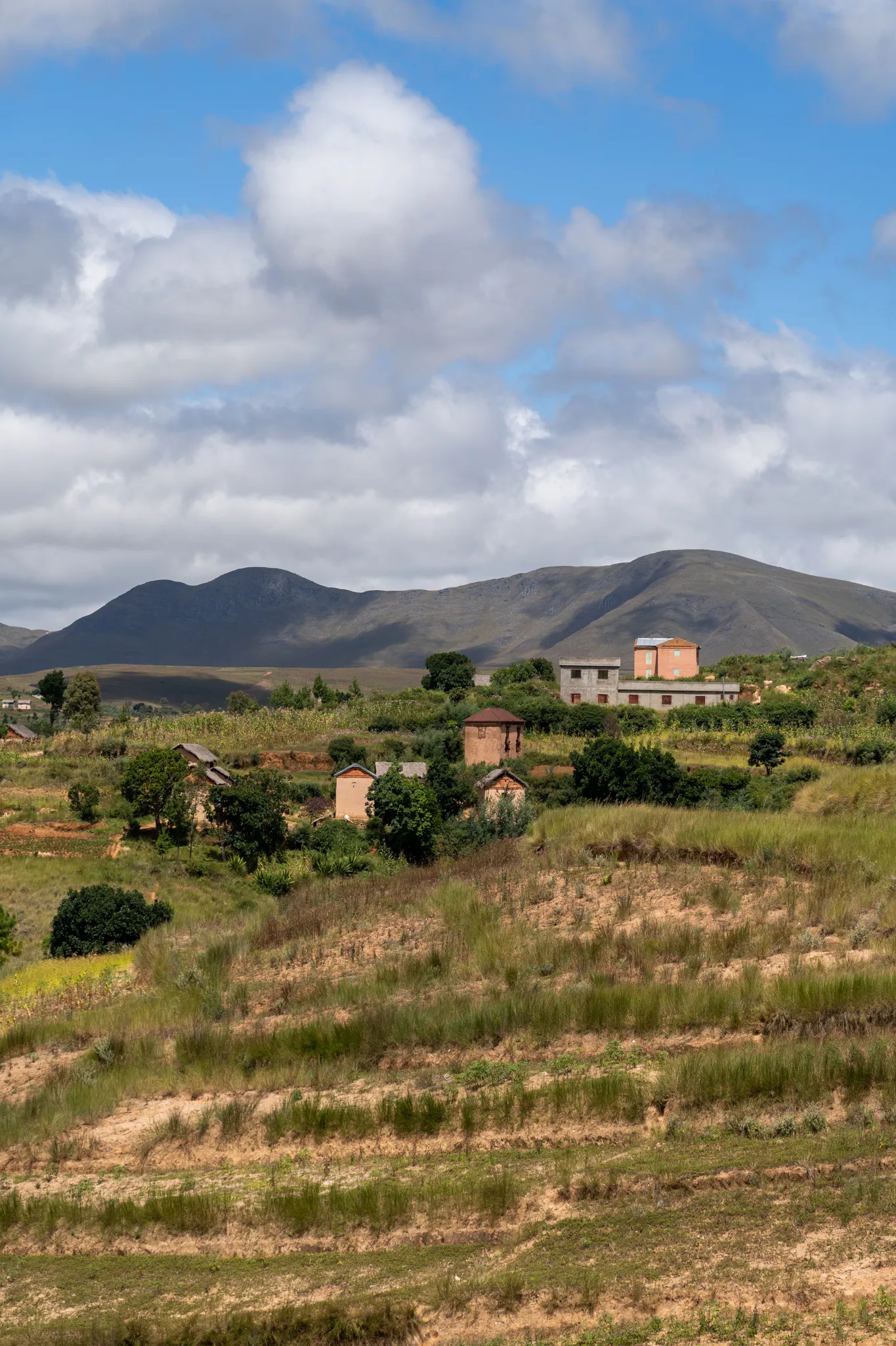 Highland village below the mountains, Madagascar
