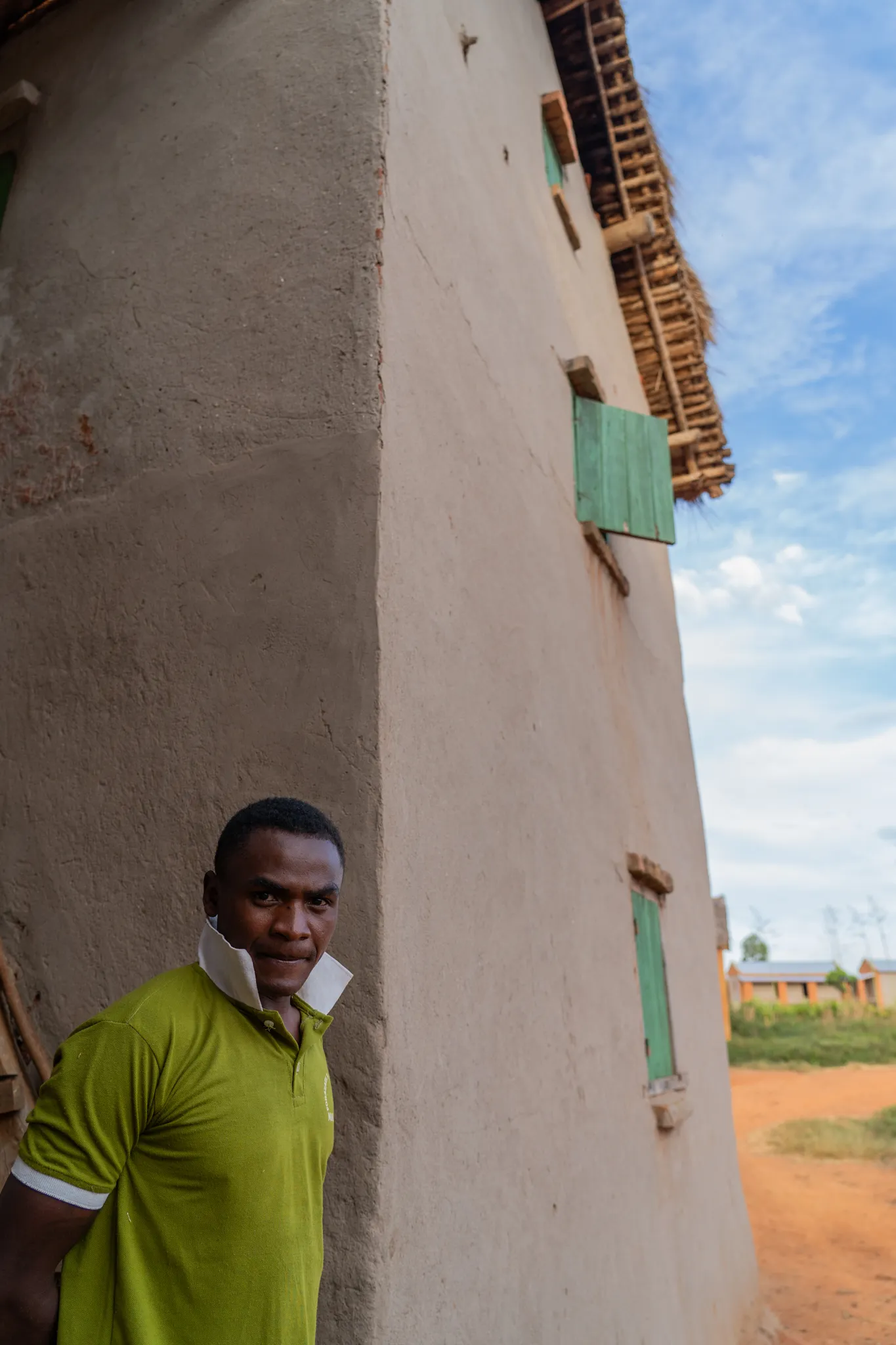 Portrait of a man beside his home in the southern highlands, Madagascar