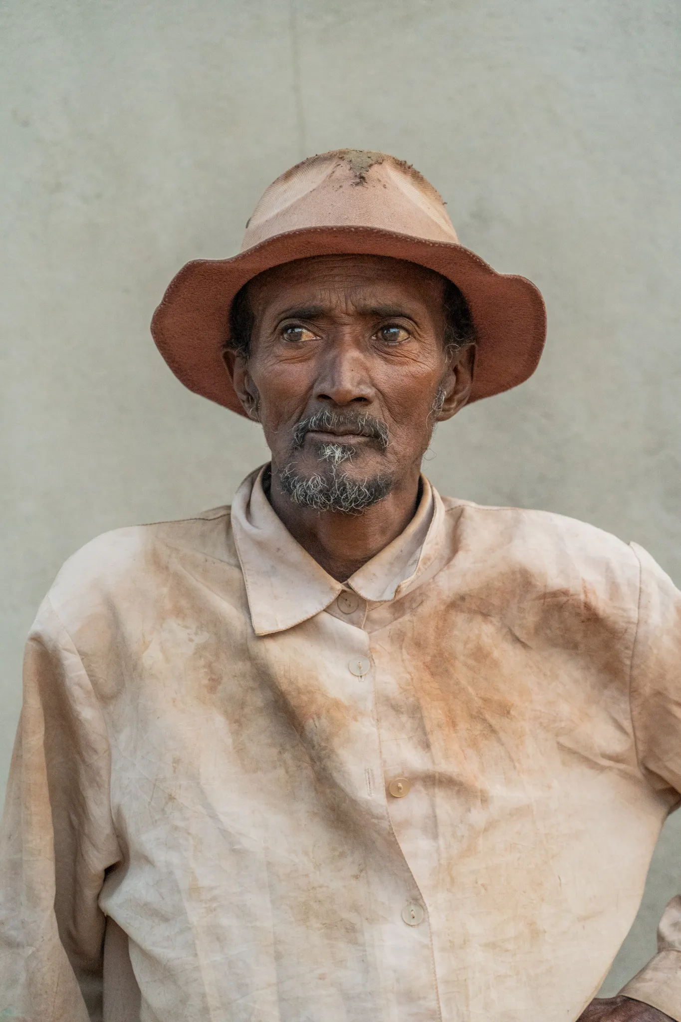 Portrait of a man in a wide-brimmed hat in southern highlands, Madagascar