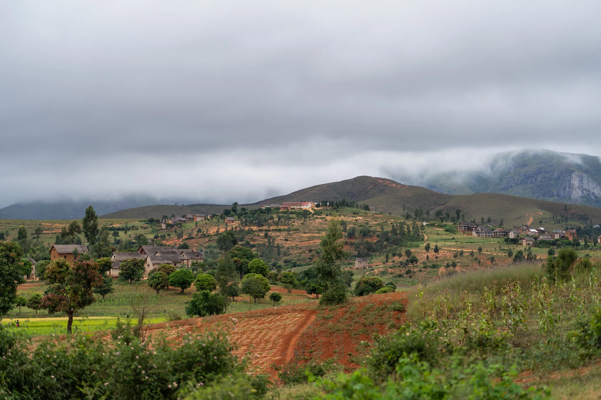 Village beneath low clouds in the southern highlands, Madagascar
