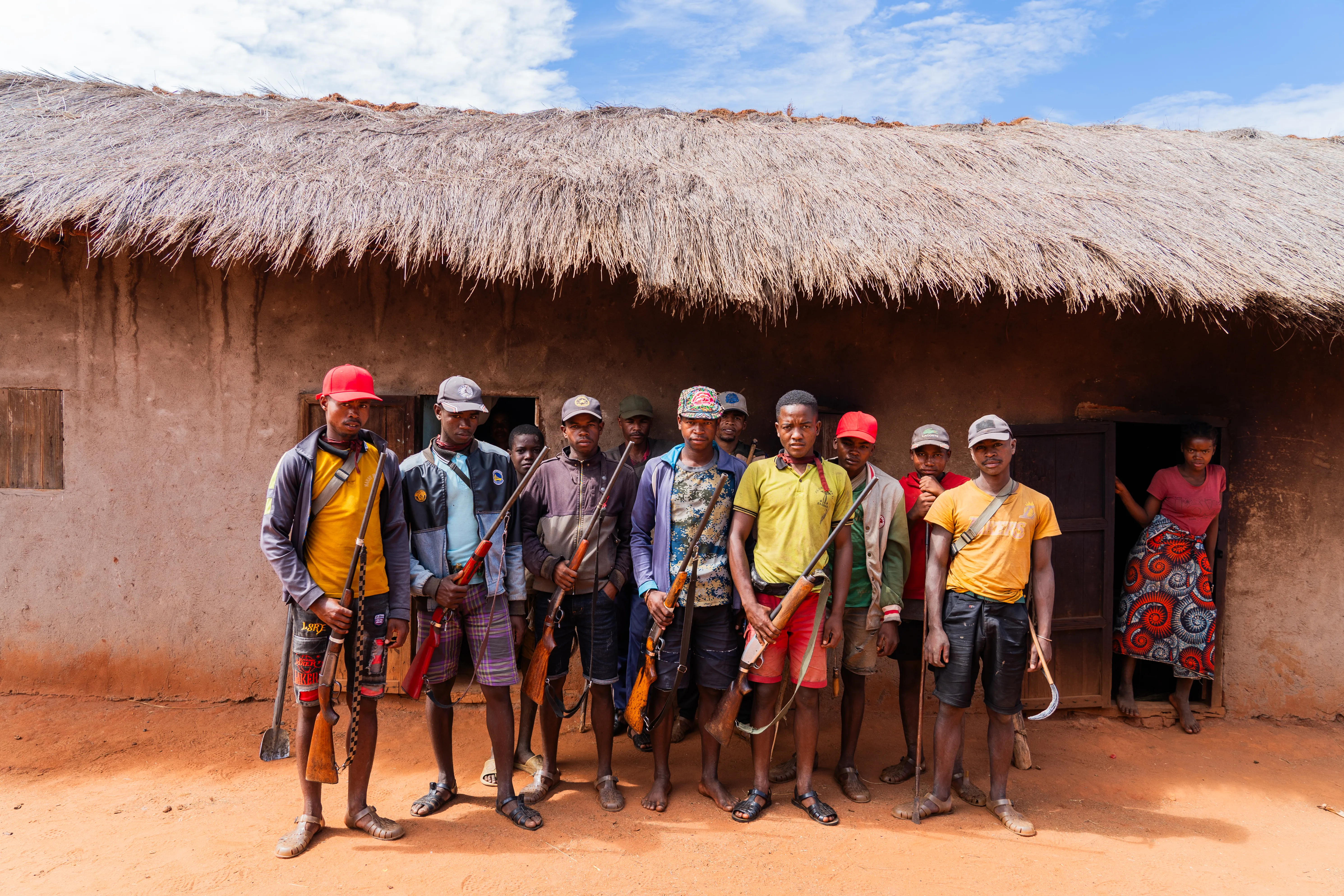 Group portrait of Bara men and one woman, Madagascar