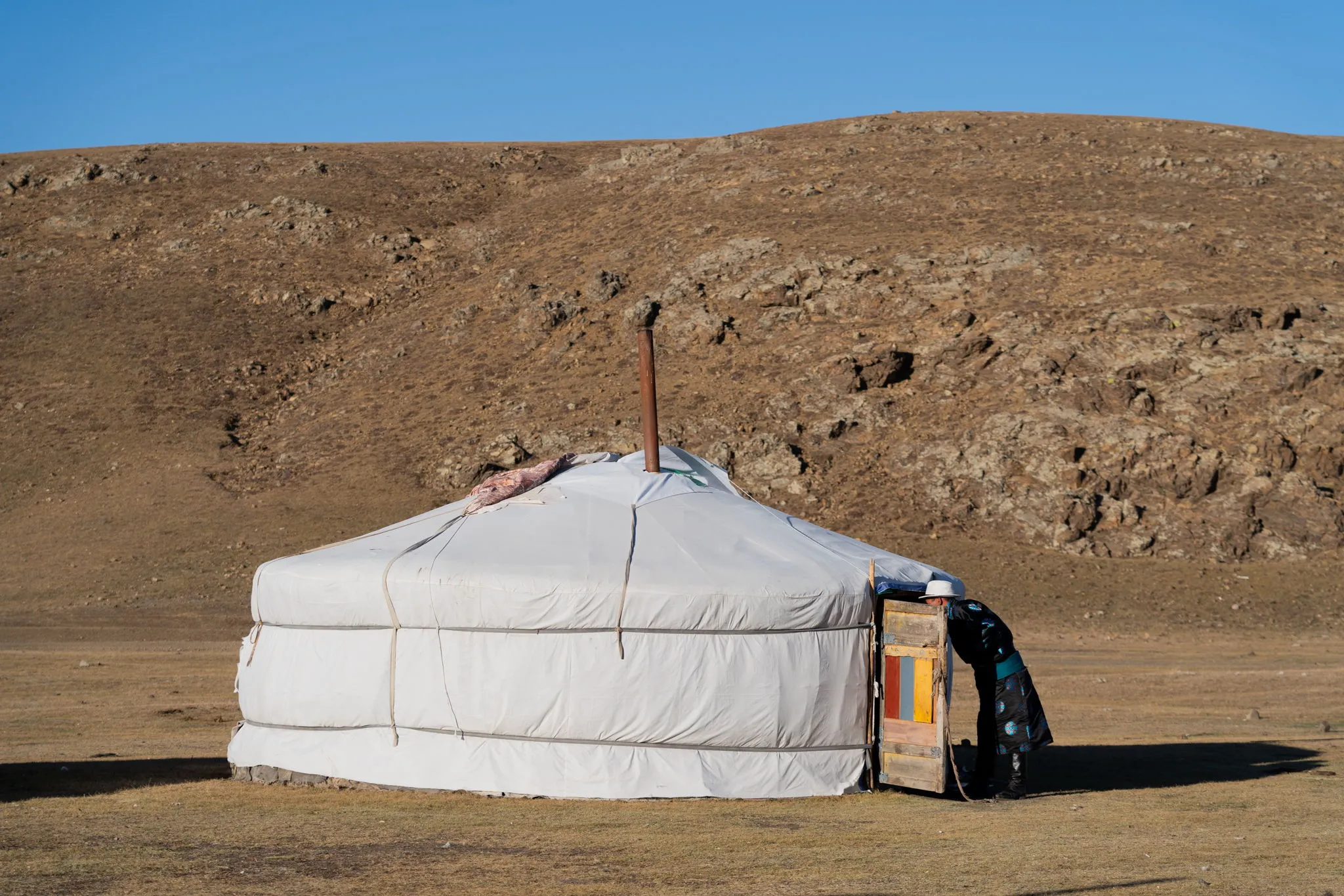 Ger door on the open steppe, Mongolia